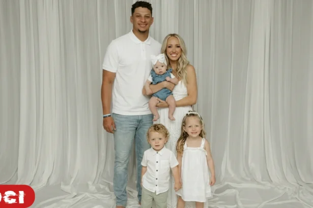 Patrick and Brittany Mahomes pictured with their three children at a public event
