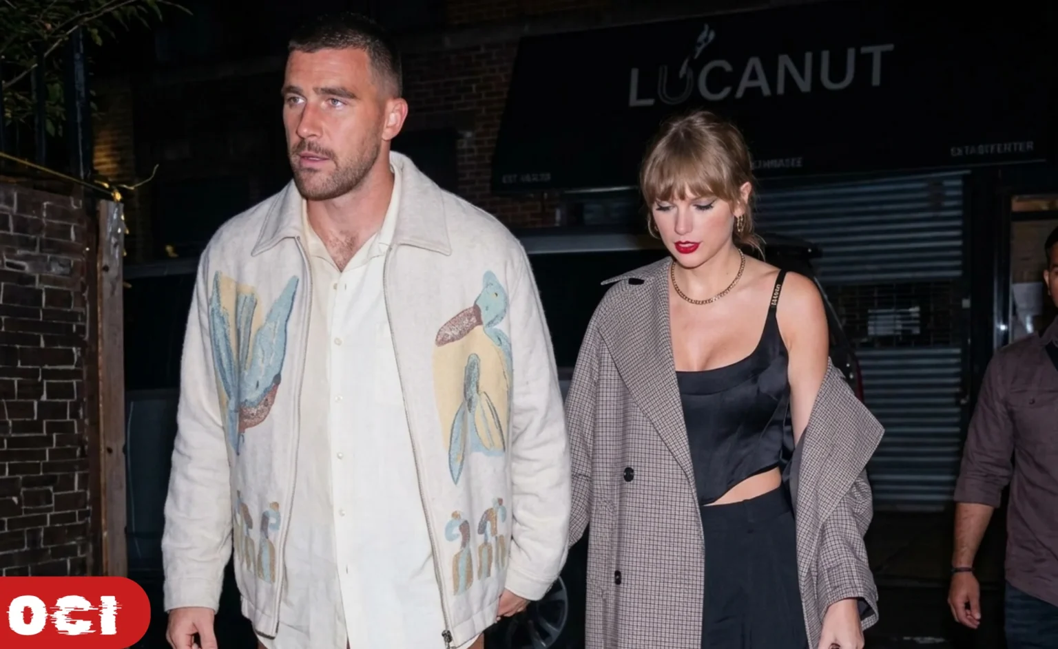 aylor Swift and Travis Kelce together at a public event